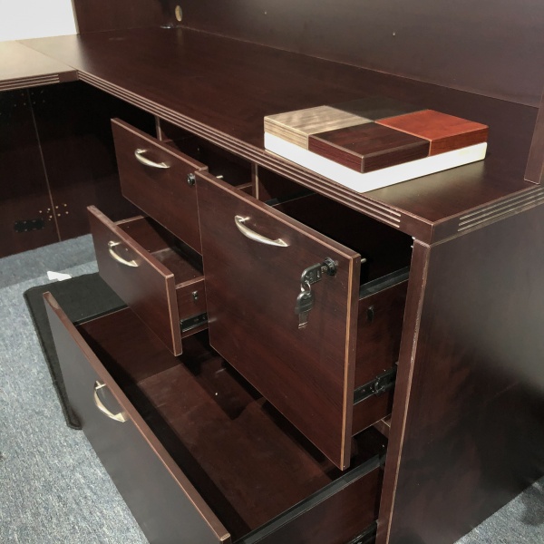 storage cabinet open on a u-shape desk