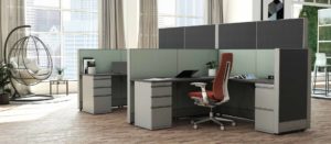 open office look with cubicles and swinging chair